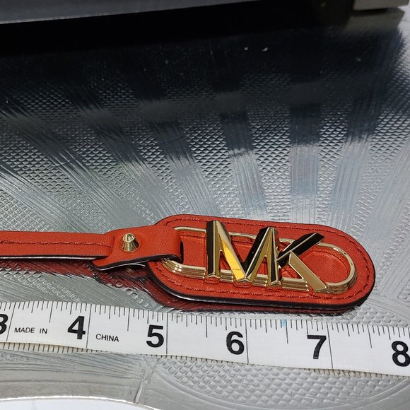 MICHAEL KORS Slip Over Handbag Charm Logo Gold MK Wording Read Leather Straps - Picture 6 of 6